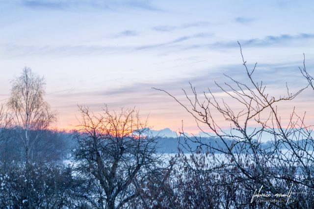 Coucher de soleil sous la neige